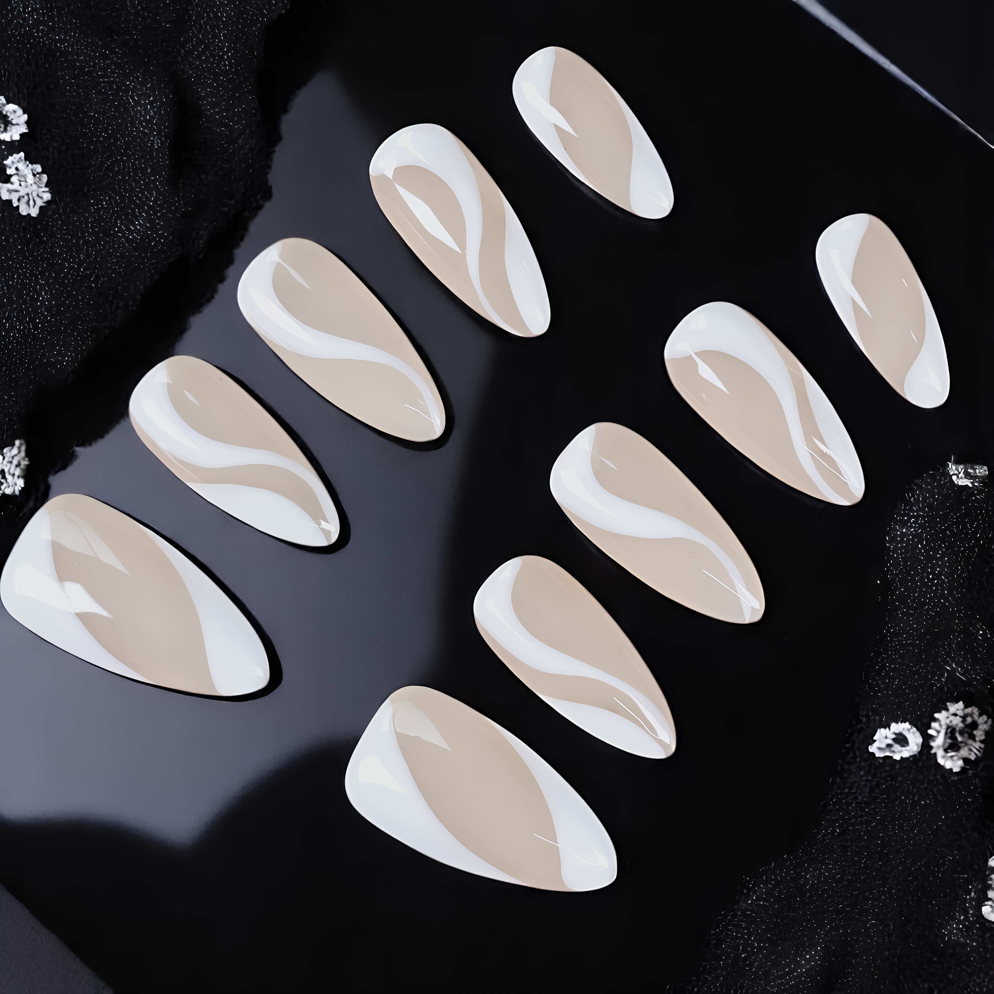 Frech Swirl Press on nails a full set, salon like quality at a fraction of cost of a manicure. Shop now