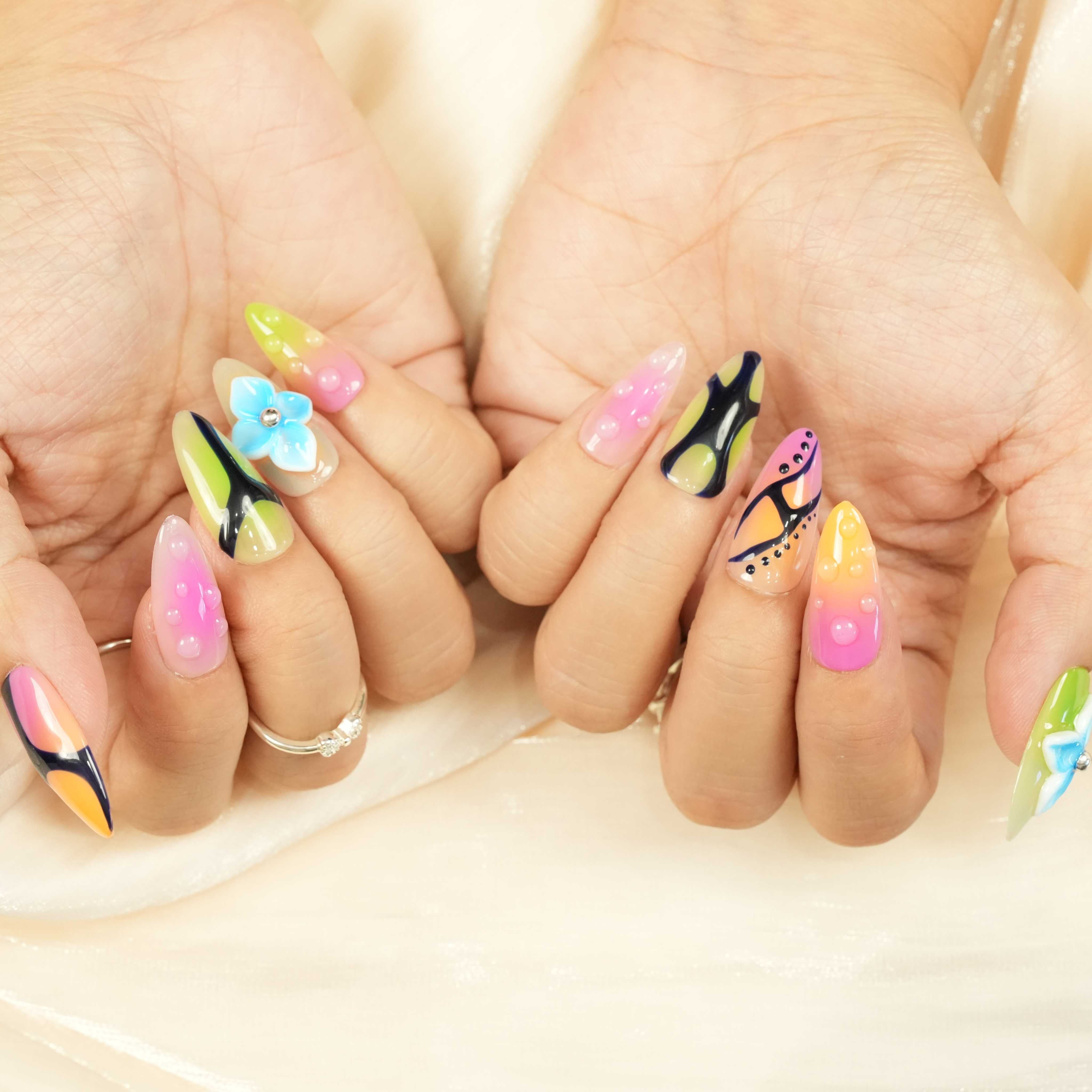 modern artistic adhesive press on nails featuring multi-colour abstract design