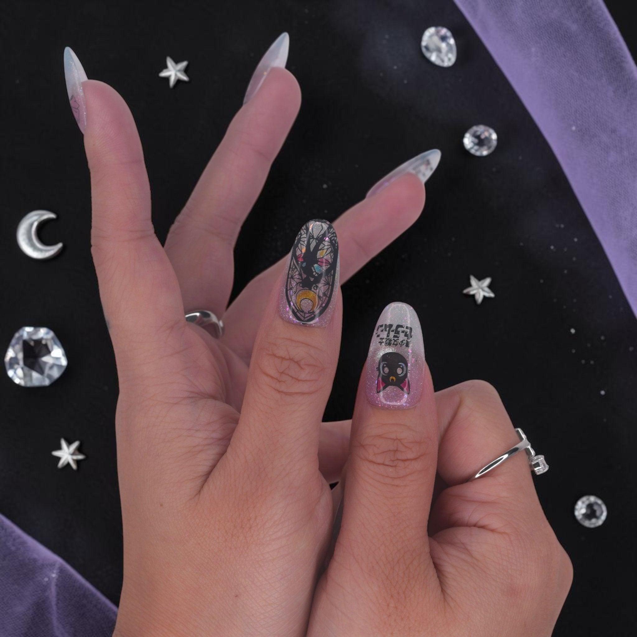 DSC00014 anime press on nails with crescent moon, bows and aurora glitter on a celestial flat lay
