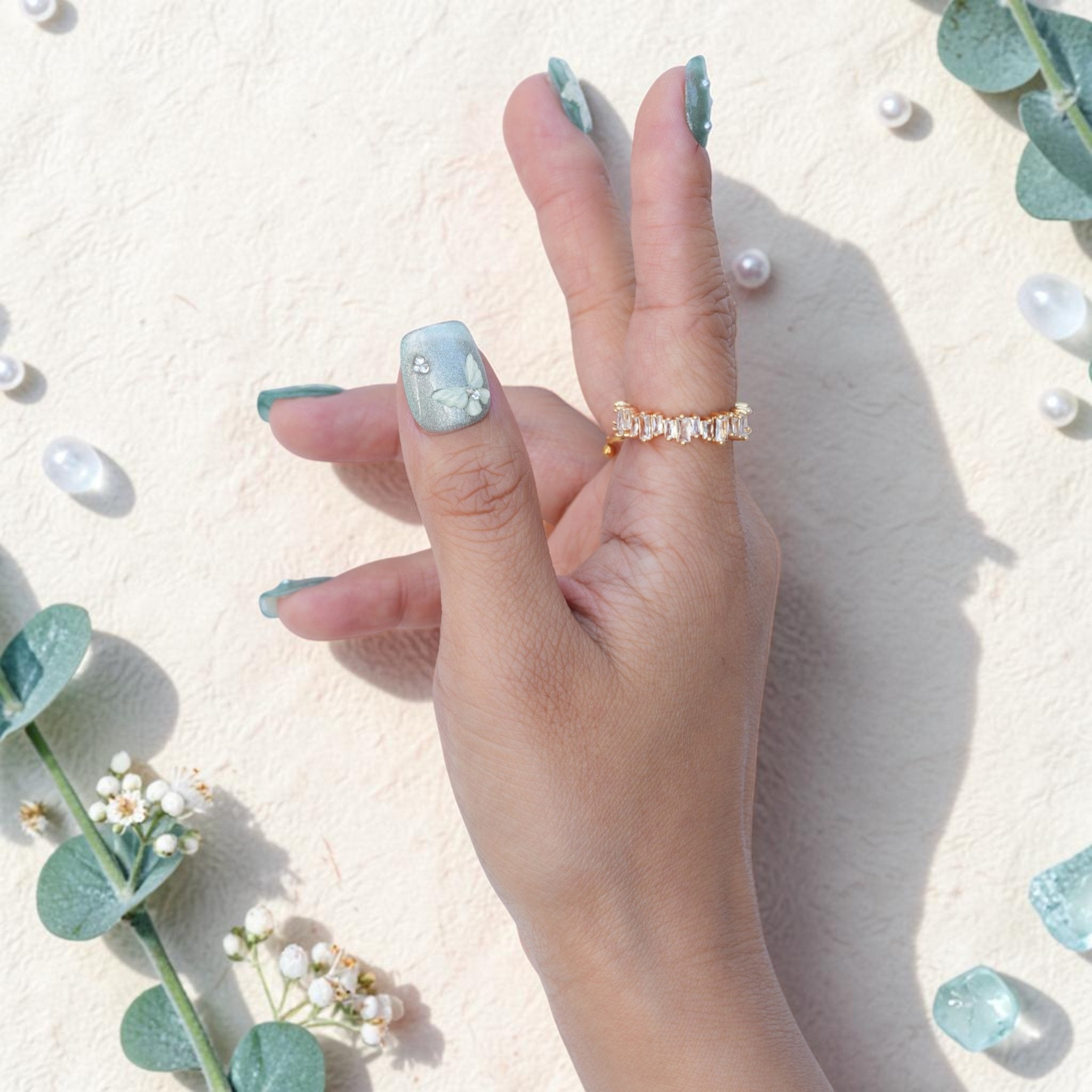 DSC00027 sage green 3D flower press on nails held with eucalyptus