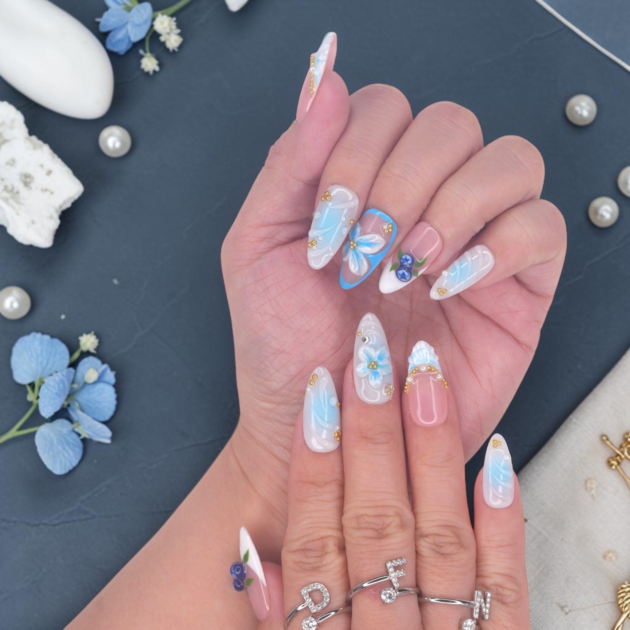 DSC00027 blueberry press on nails with blue flowers, feather brushwork and crystals