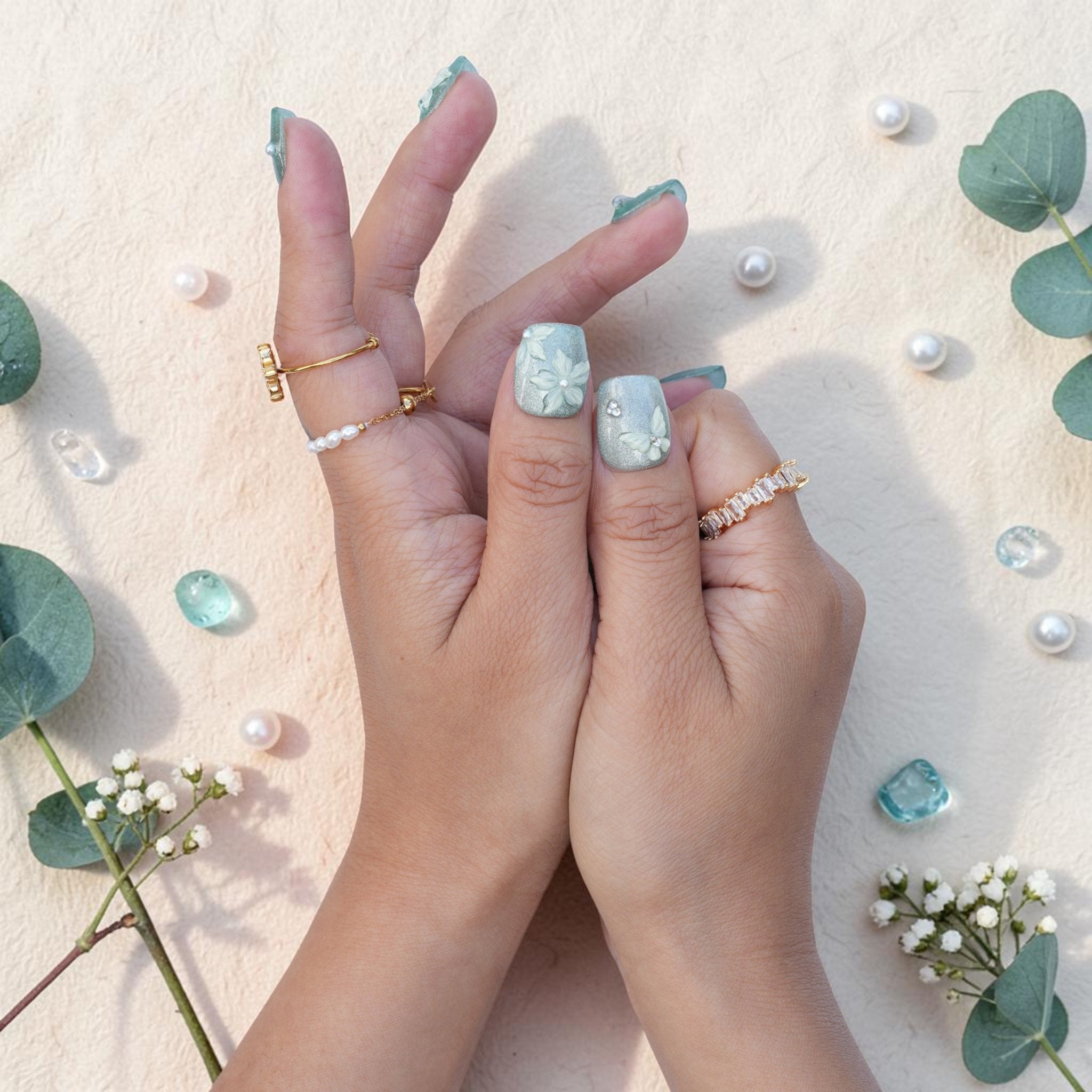 DSC00029 close up of green cat eye press on nails with 3D white flowers