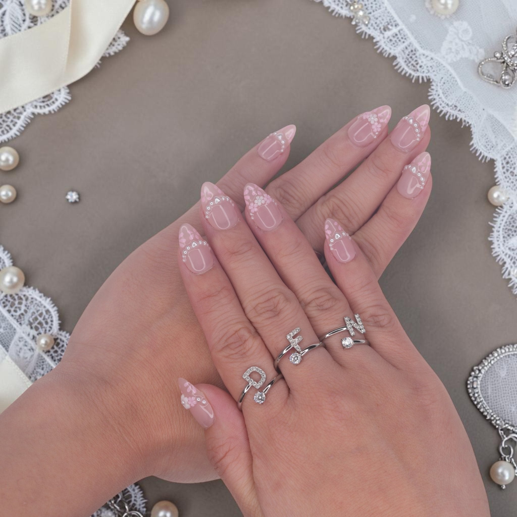 DSC00040 close up of coquette press on nails with 3D flowers and silver hearts