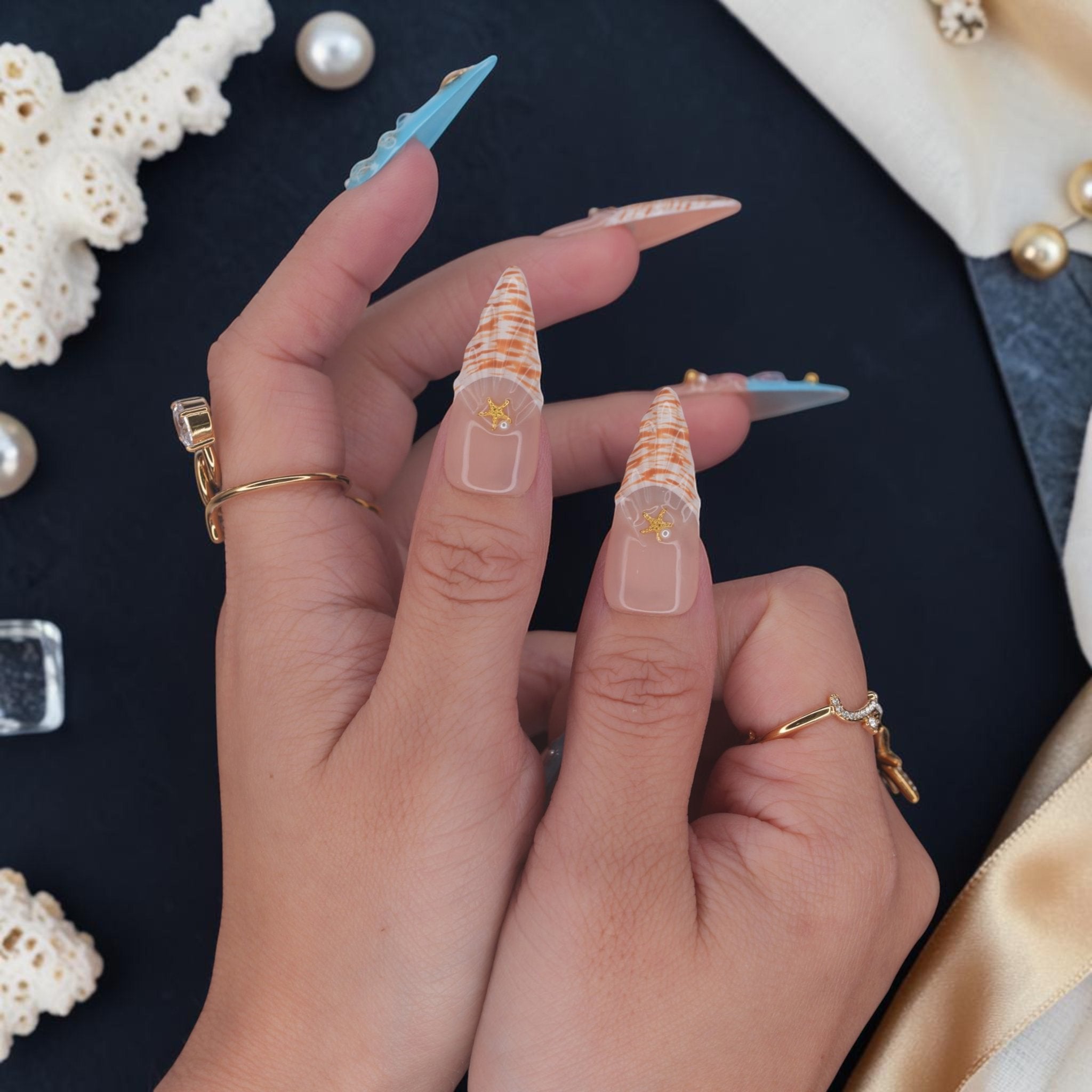 DSC00067 close up of mermaid press on nails with nautilus shell tips and gold starfish