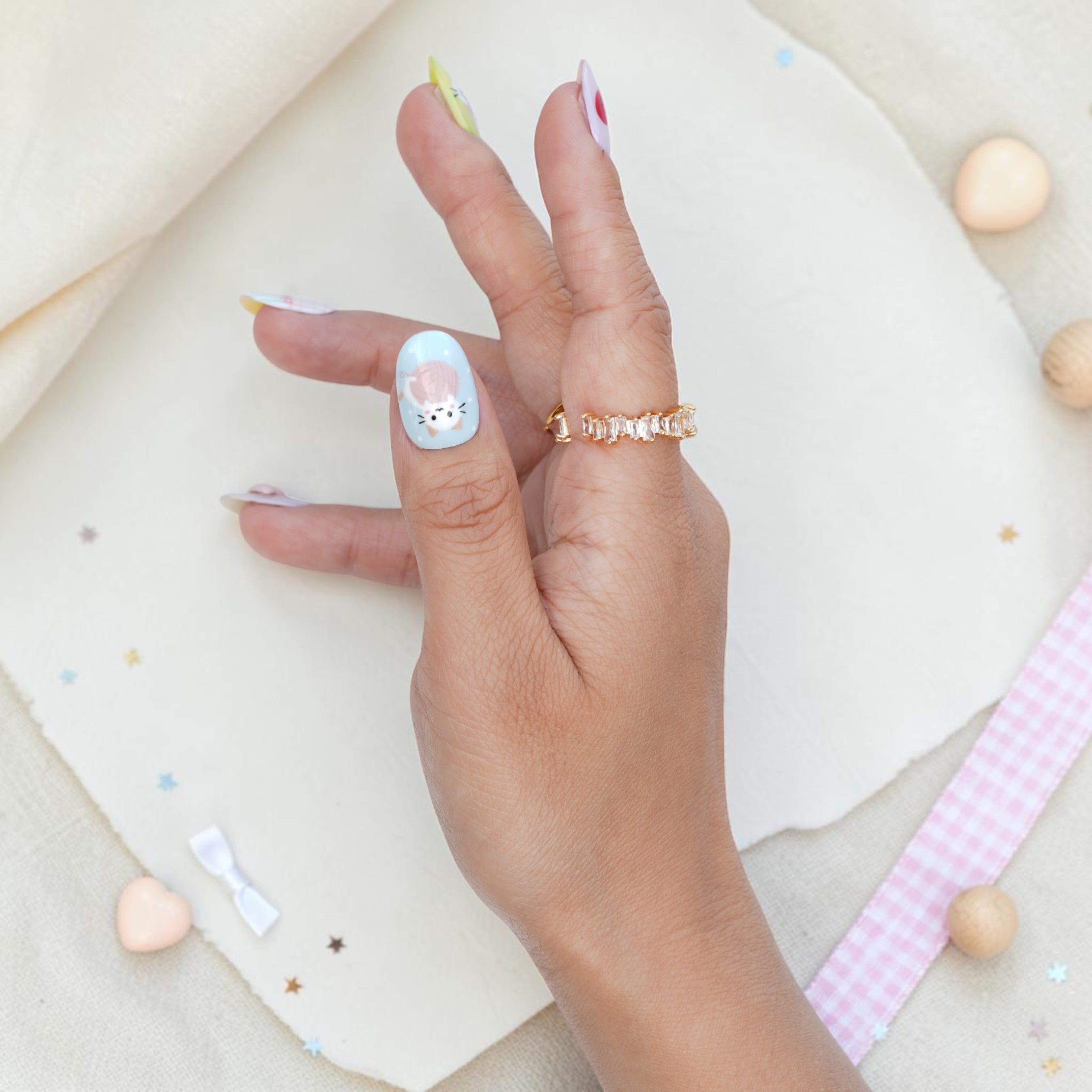 Cute kawaii press on nails with cartoon kittens, apple and cottage designs