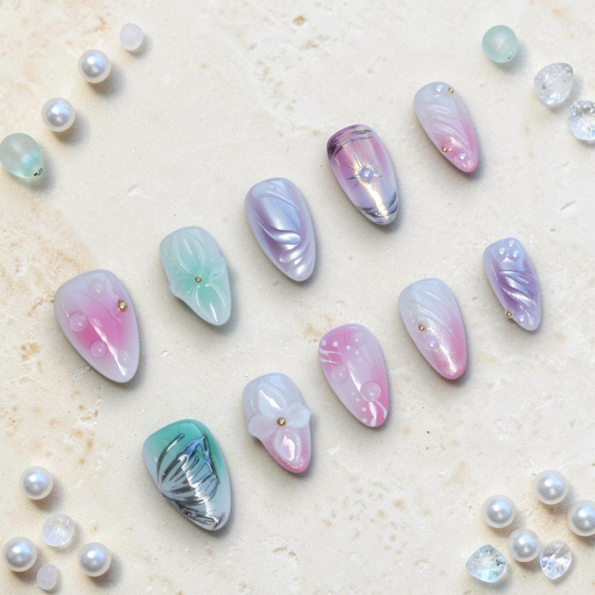 Opal Dream aura press on nails full set in pastel pink, lilac and mint with iridescent shimmer and 3D flowers