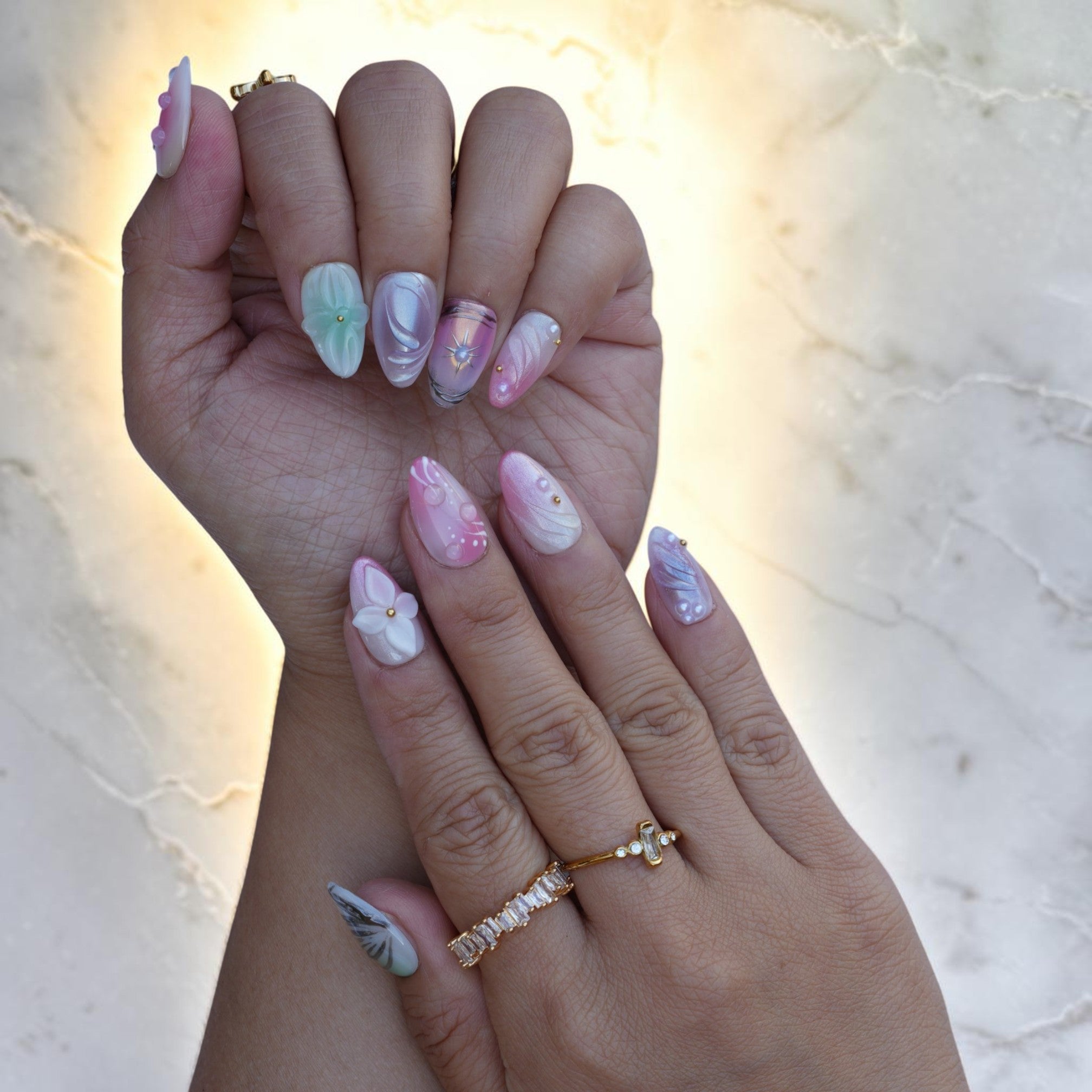 Iridescent press on nails with silver butterfly wing and pearl accents
