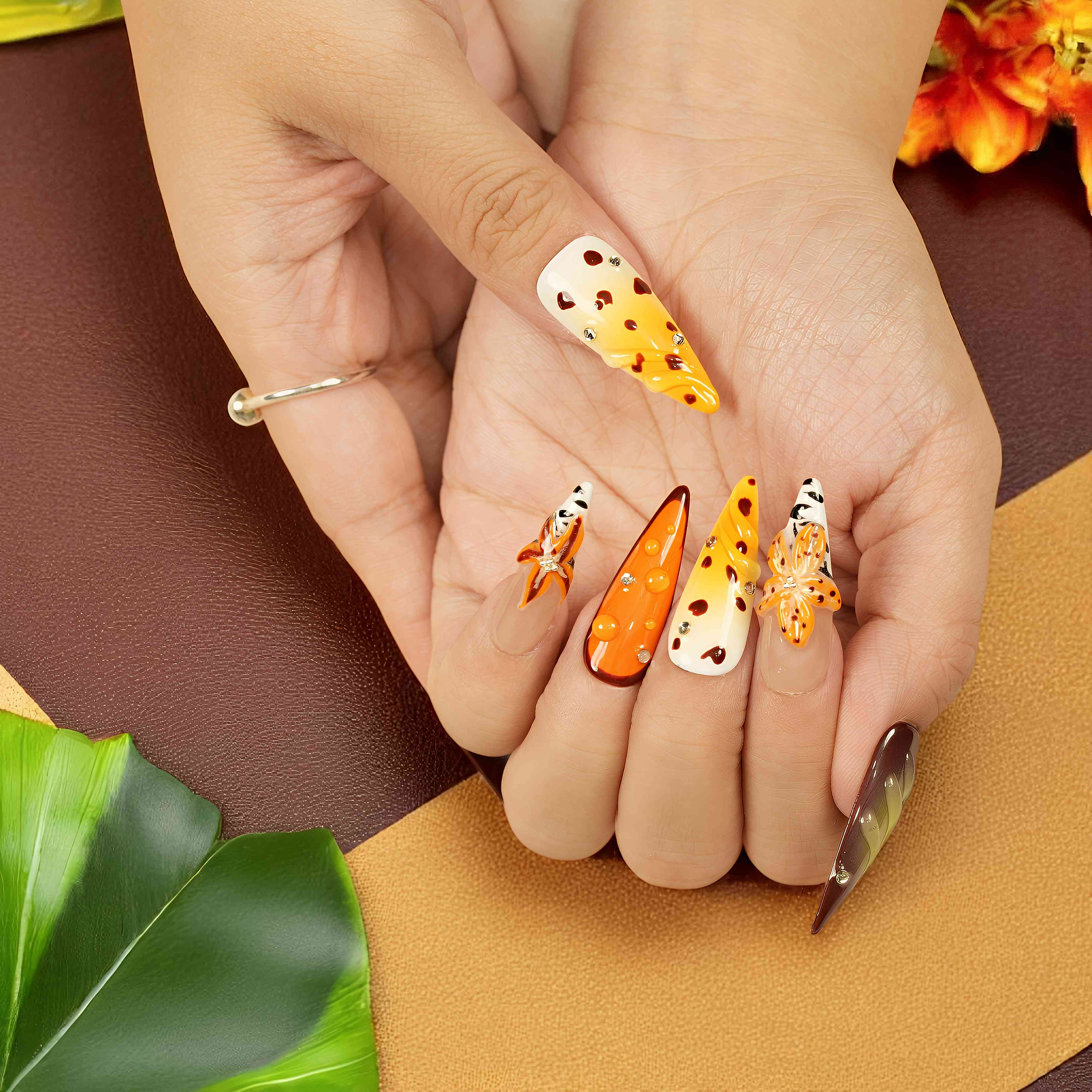 full set of savannah themed stick on nails with wildflower art