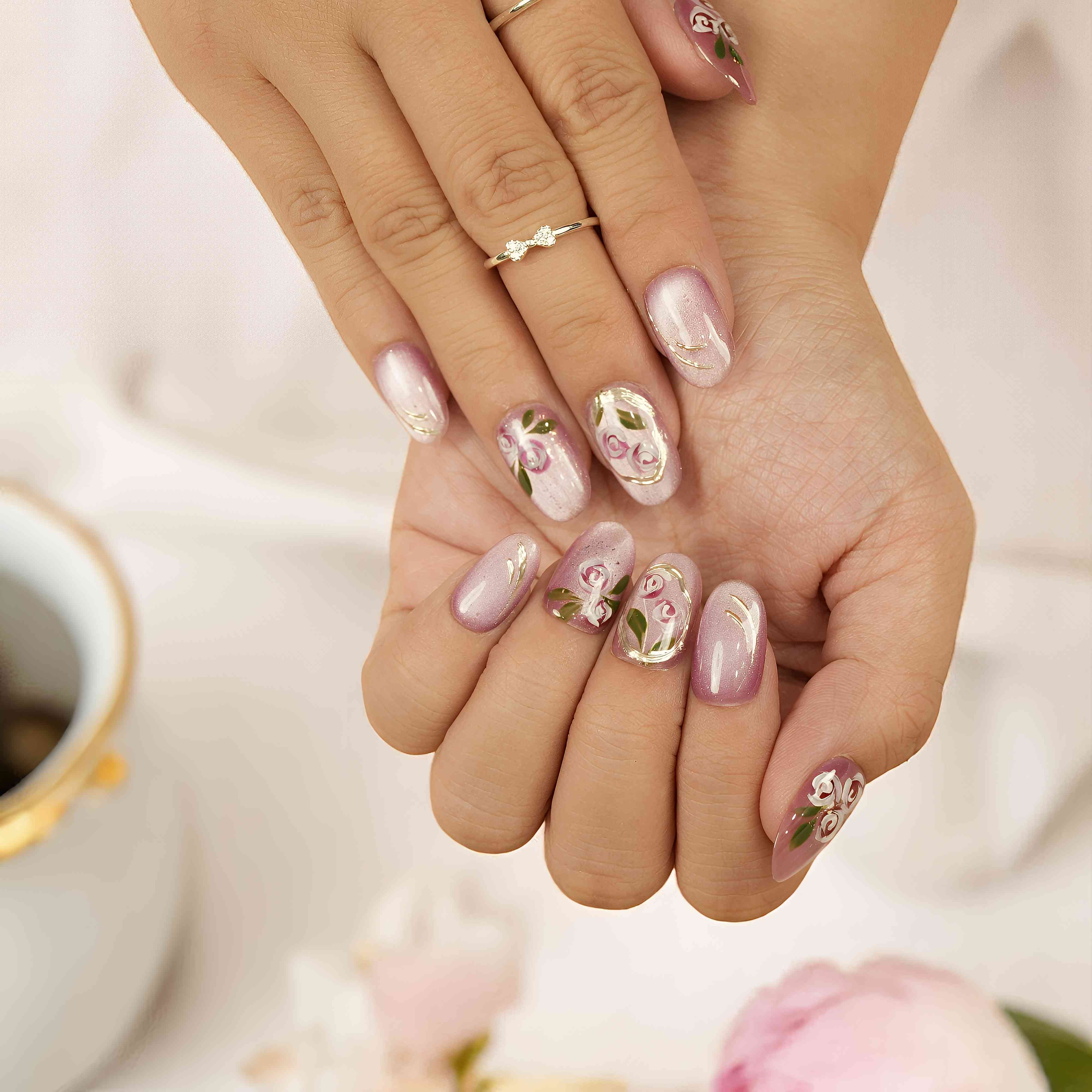 Glossy press on nails in mauve with gold shimmer and rose art – cat’s eye handmade nails