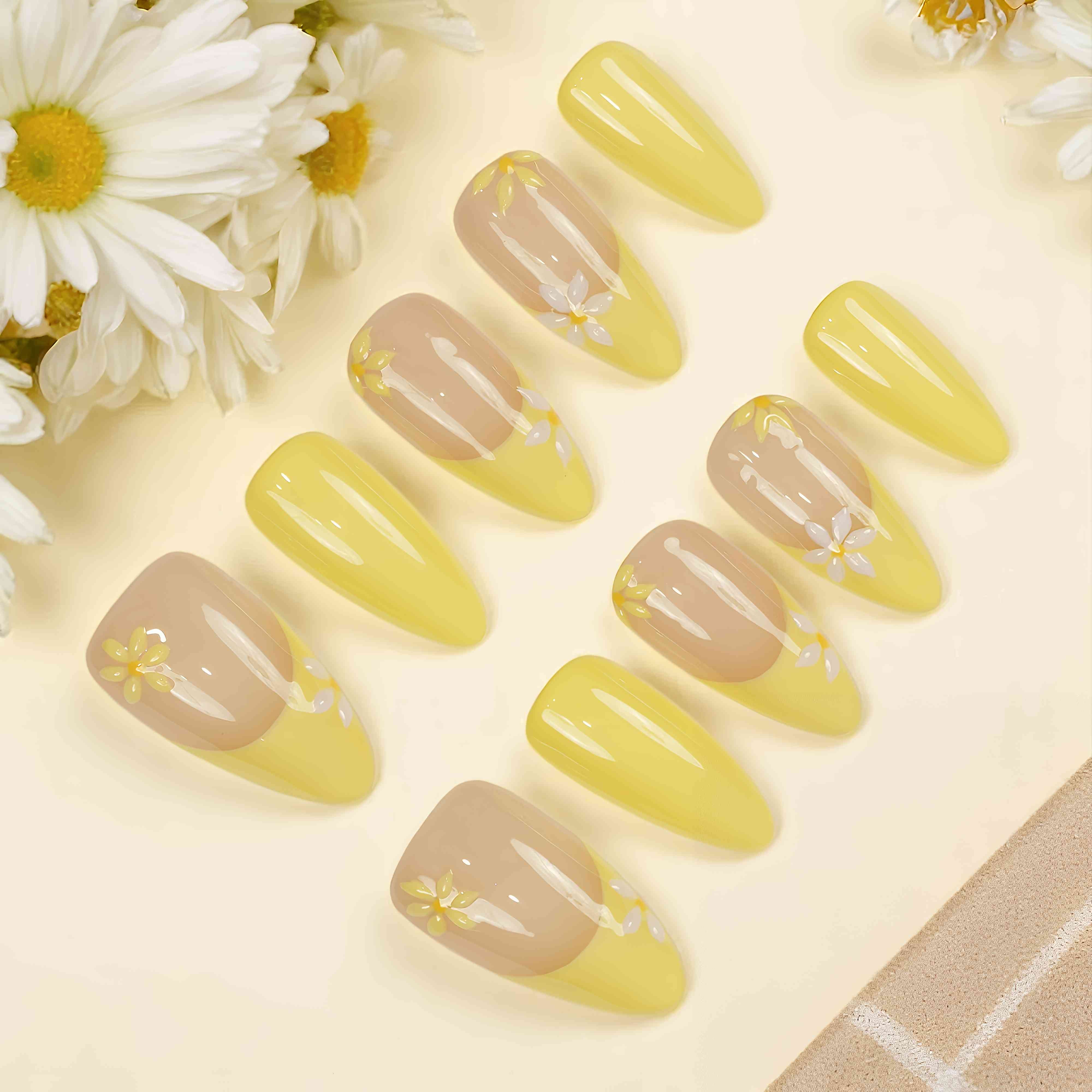 Yellow floral press on nails with daisy design on neutral base – reusable and handmade in Australia