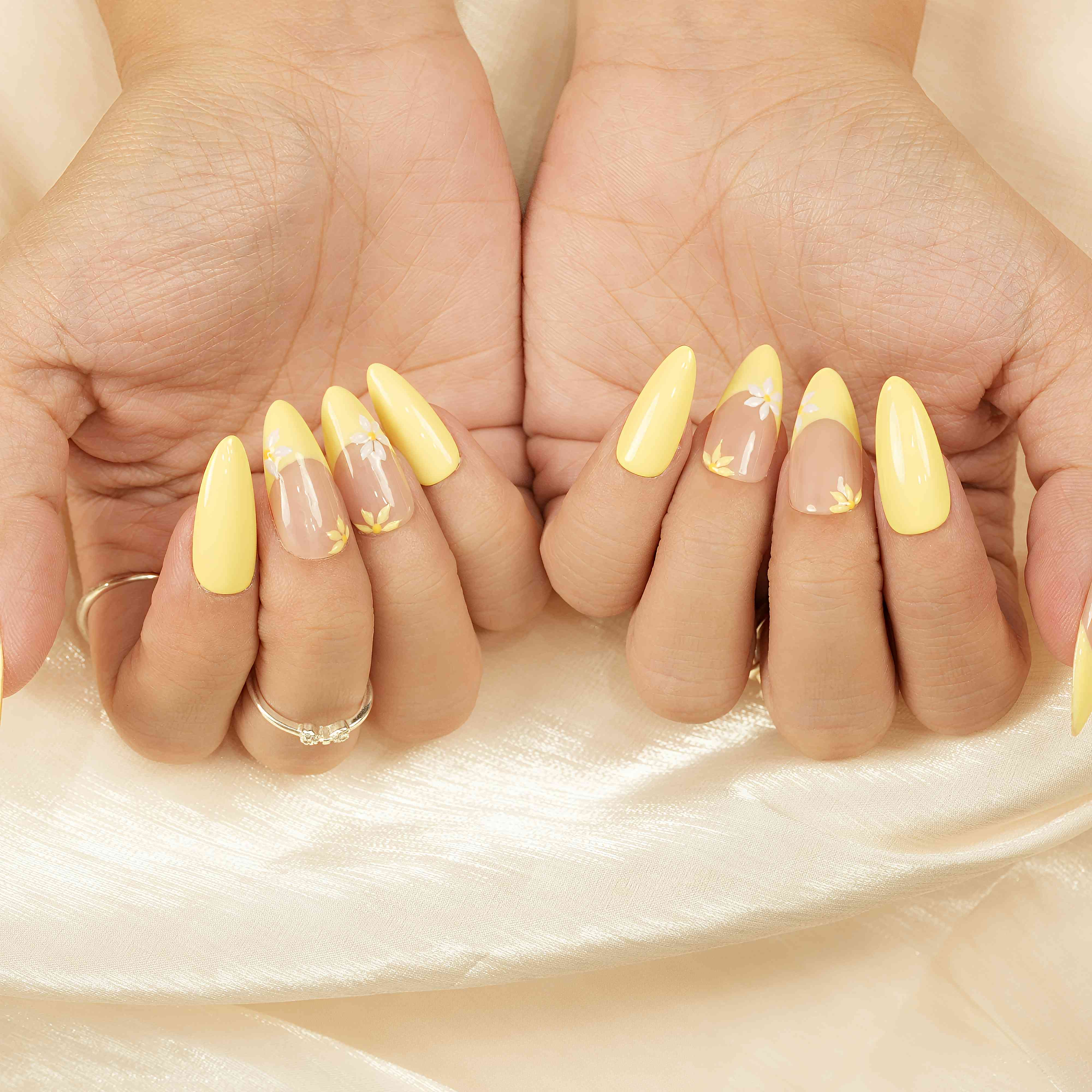 Yellow floral press on nails with daisy design on neutral base – reusable and handmade in Australia