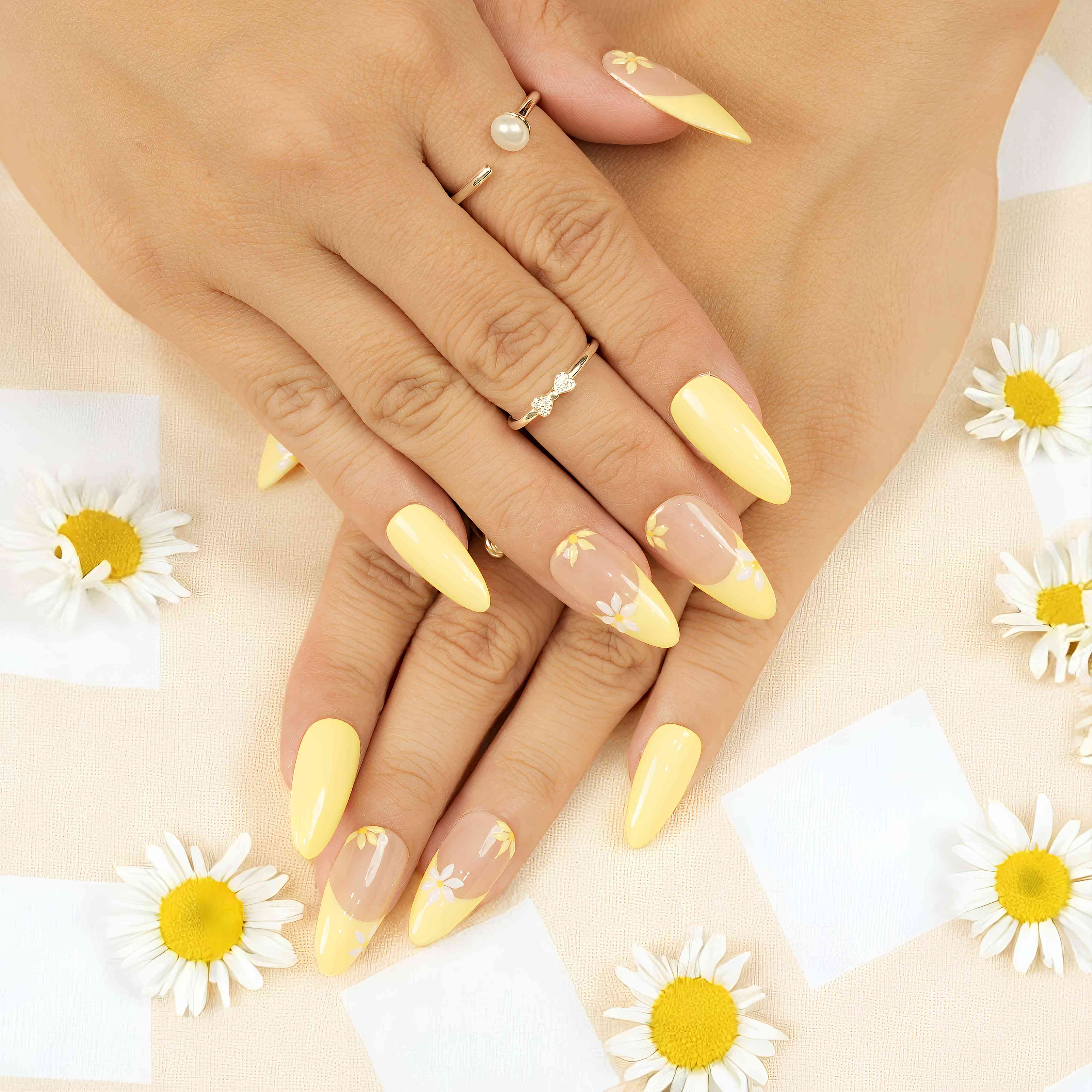 Australian press on nails featuring yellow tips and daisy details