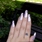 Glossy lavender and white coffin-shaped press on nails with French tips, worn outdoors – long reusable stick on nails Australia