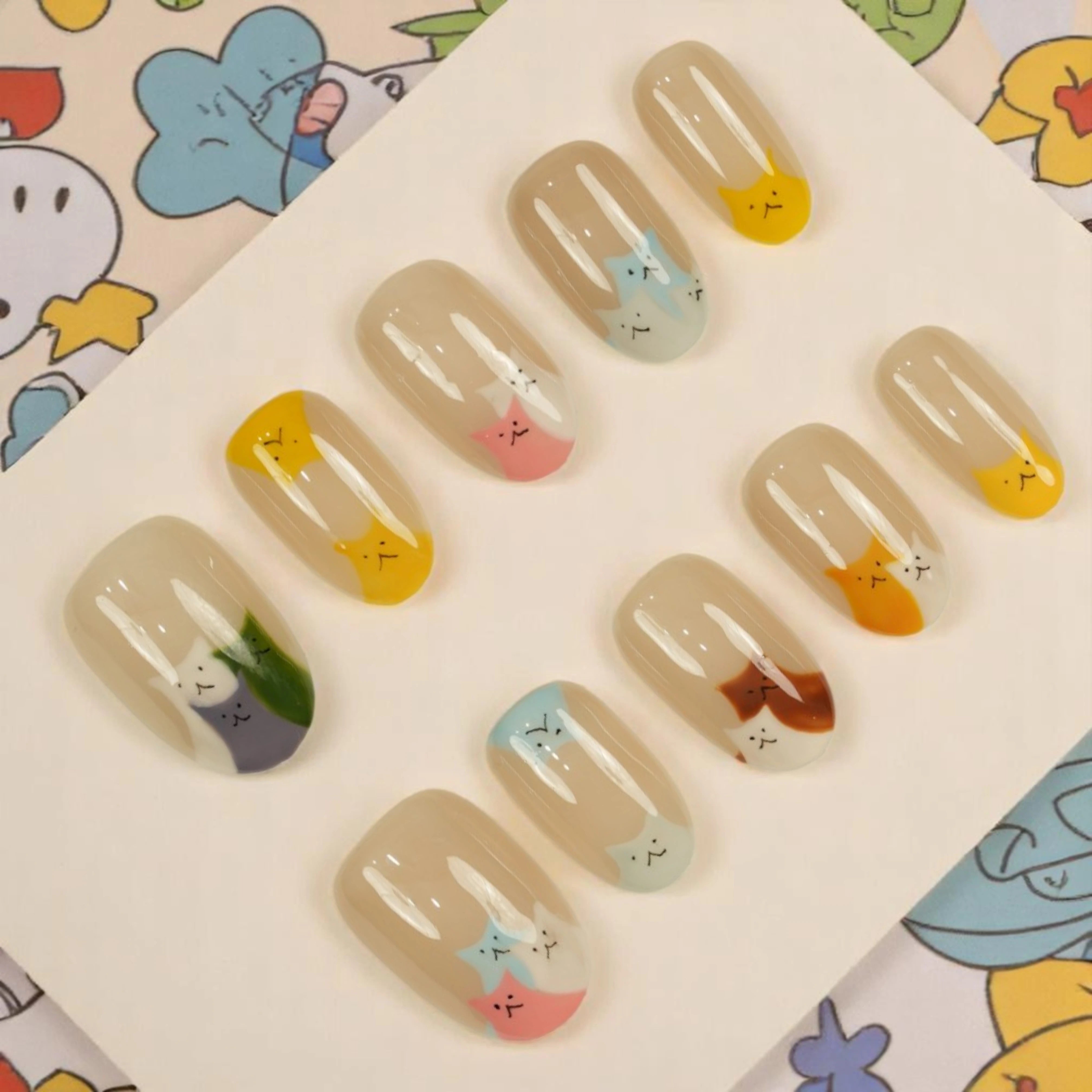 Purrfect Charm Cats press on nails close-up featuring green and grey cat face accent