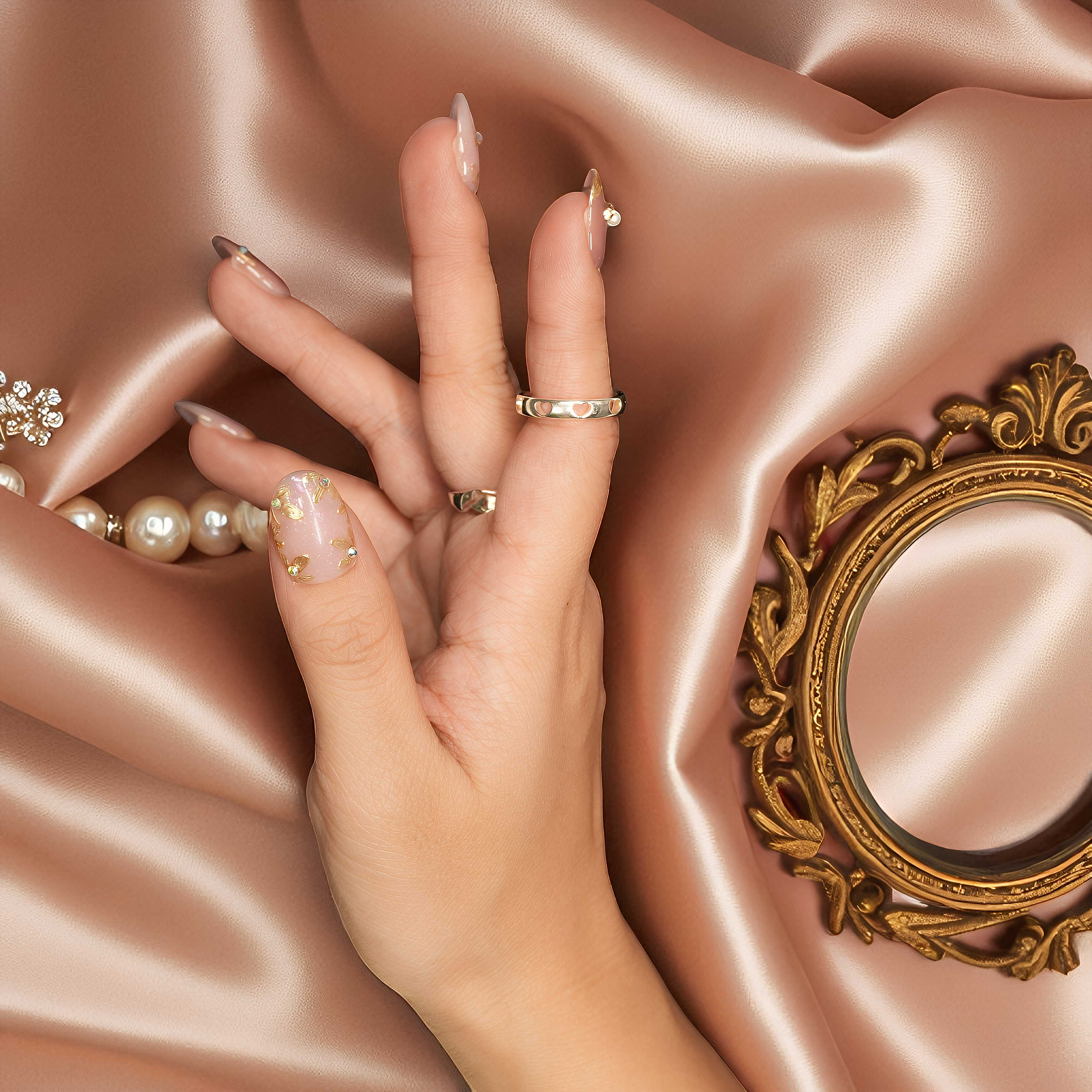 Golden Petal Veil press on nails with floral gold cat’s eye shimmer