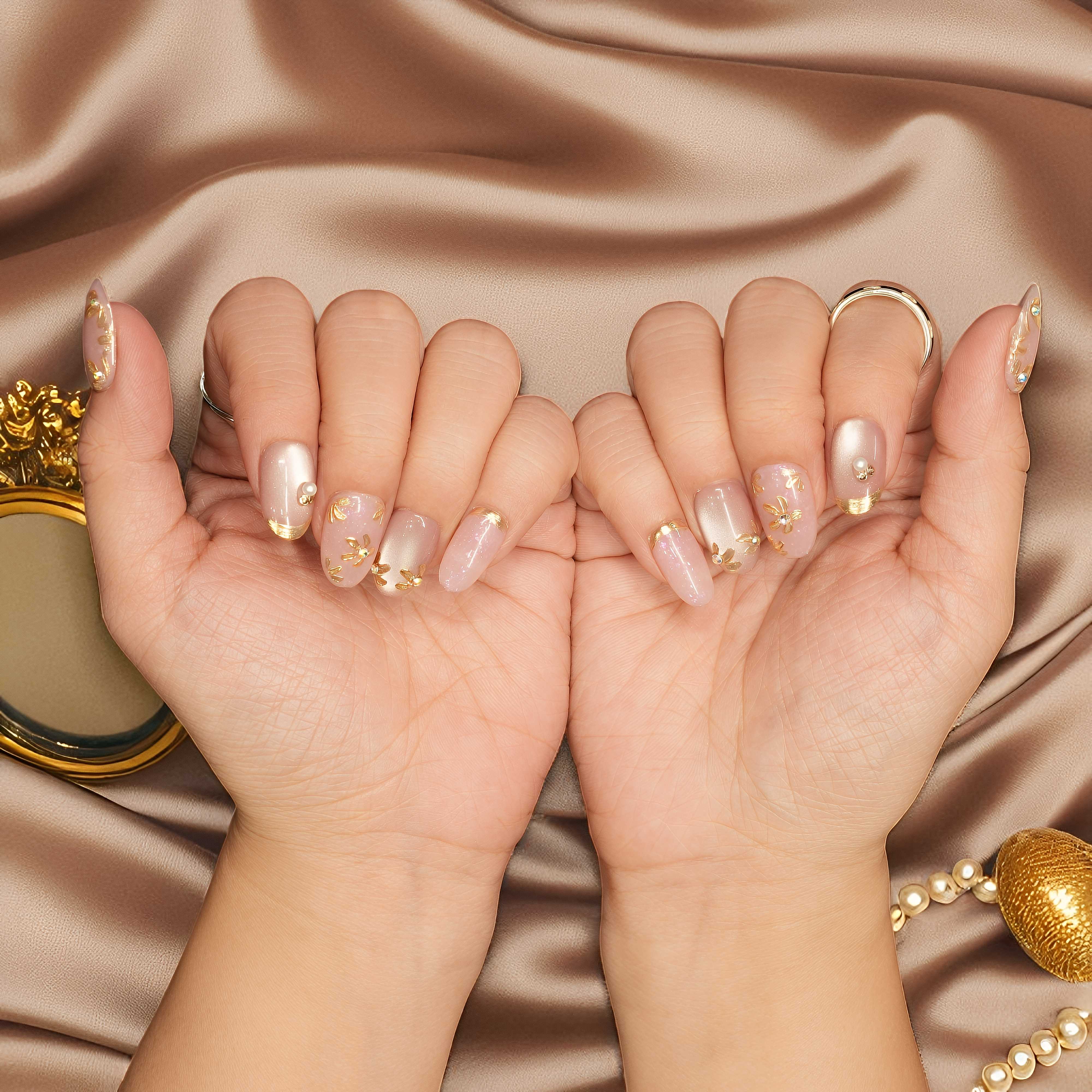 Floral gold cat’s eye press on nails with pearls and foil accents