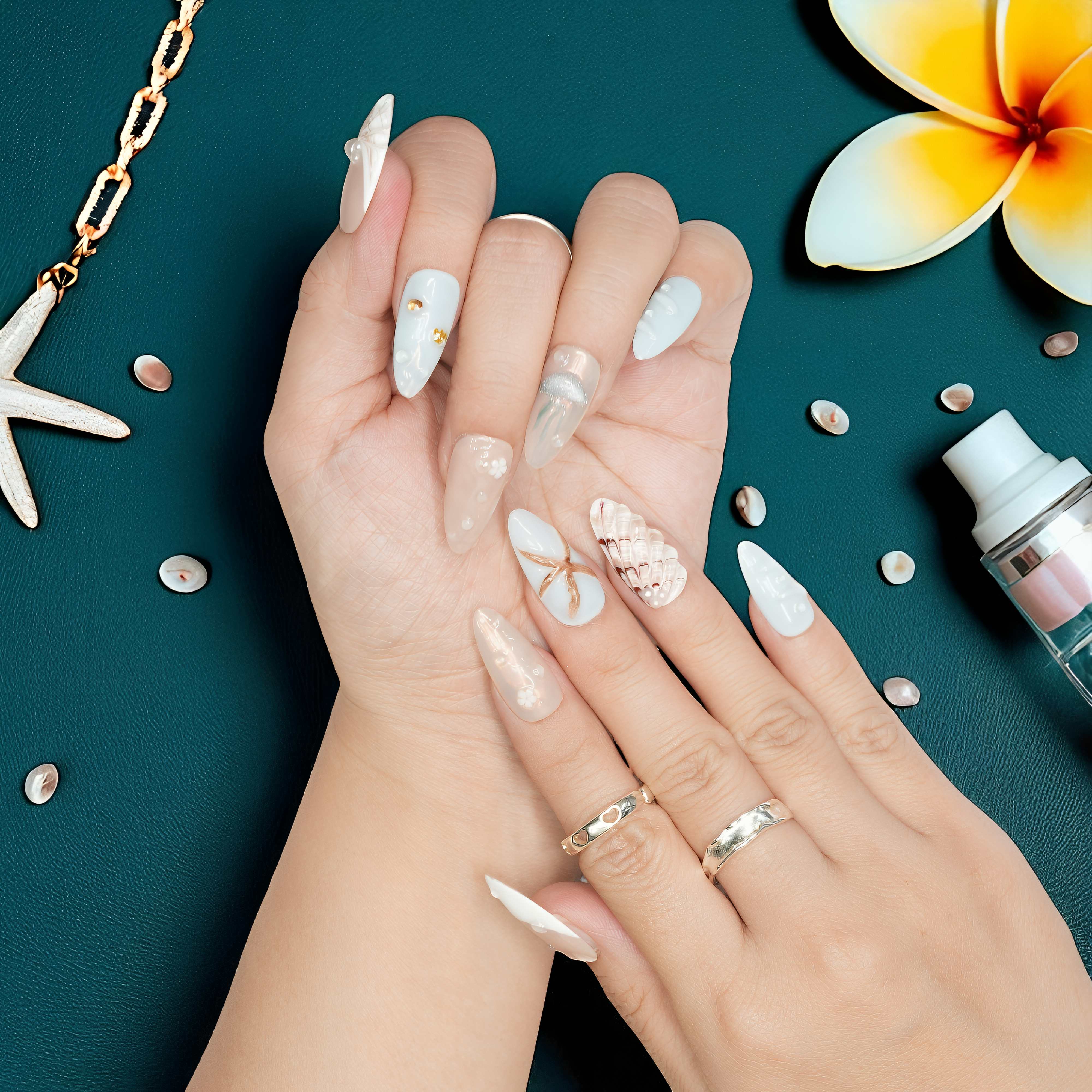 Starfish 3D nail with glittery finish in light aqua and pastel hues