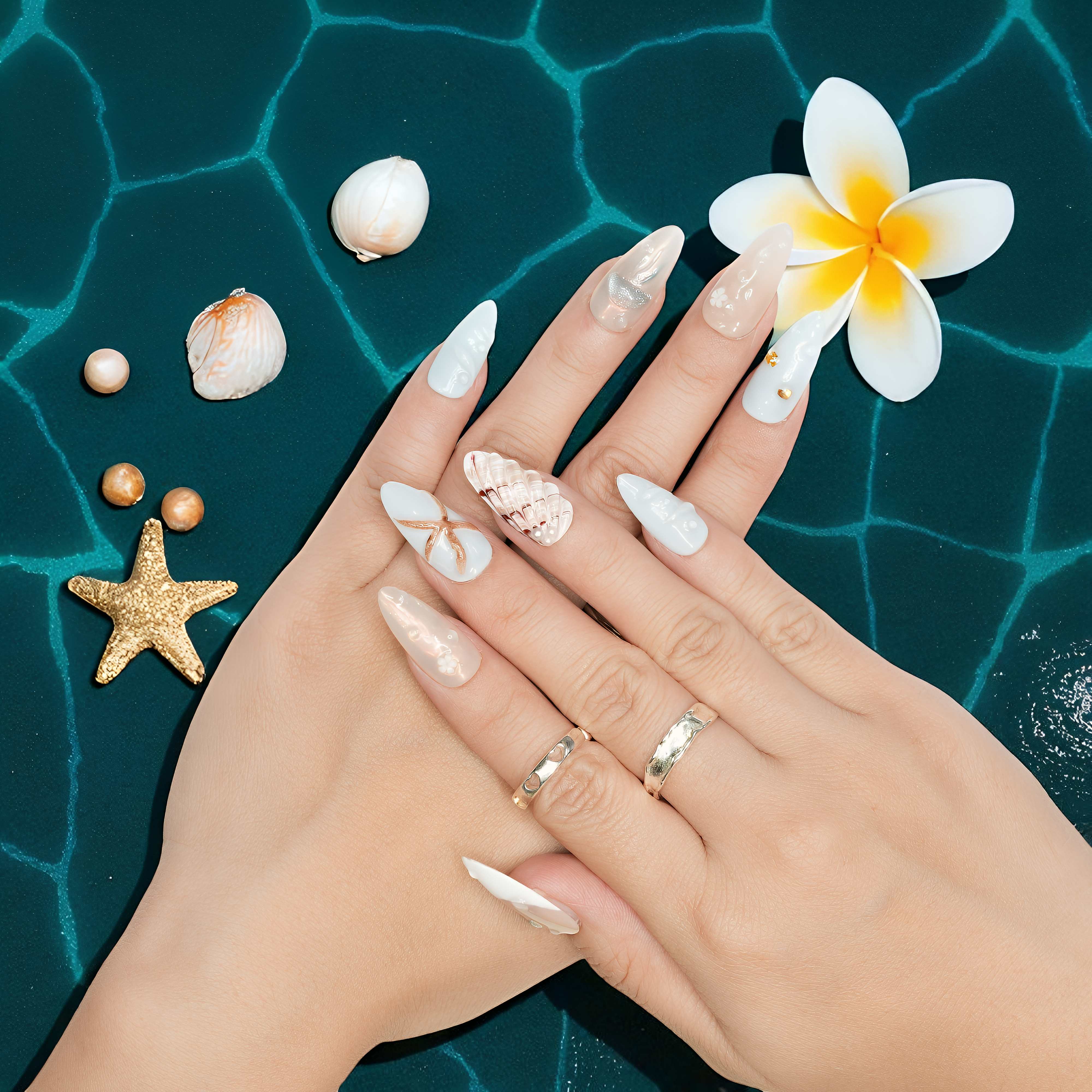 Flatlay of all jelly press on nails with seashell, starfish, jellyfish designs