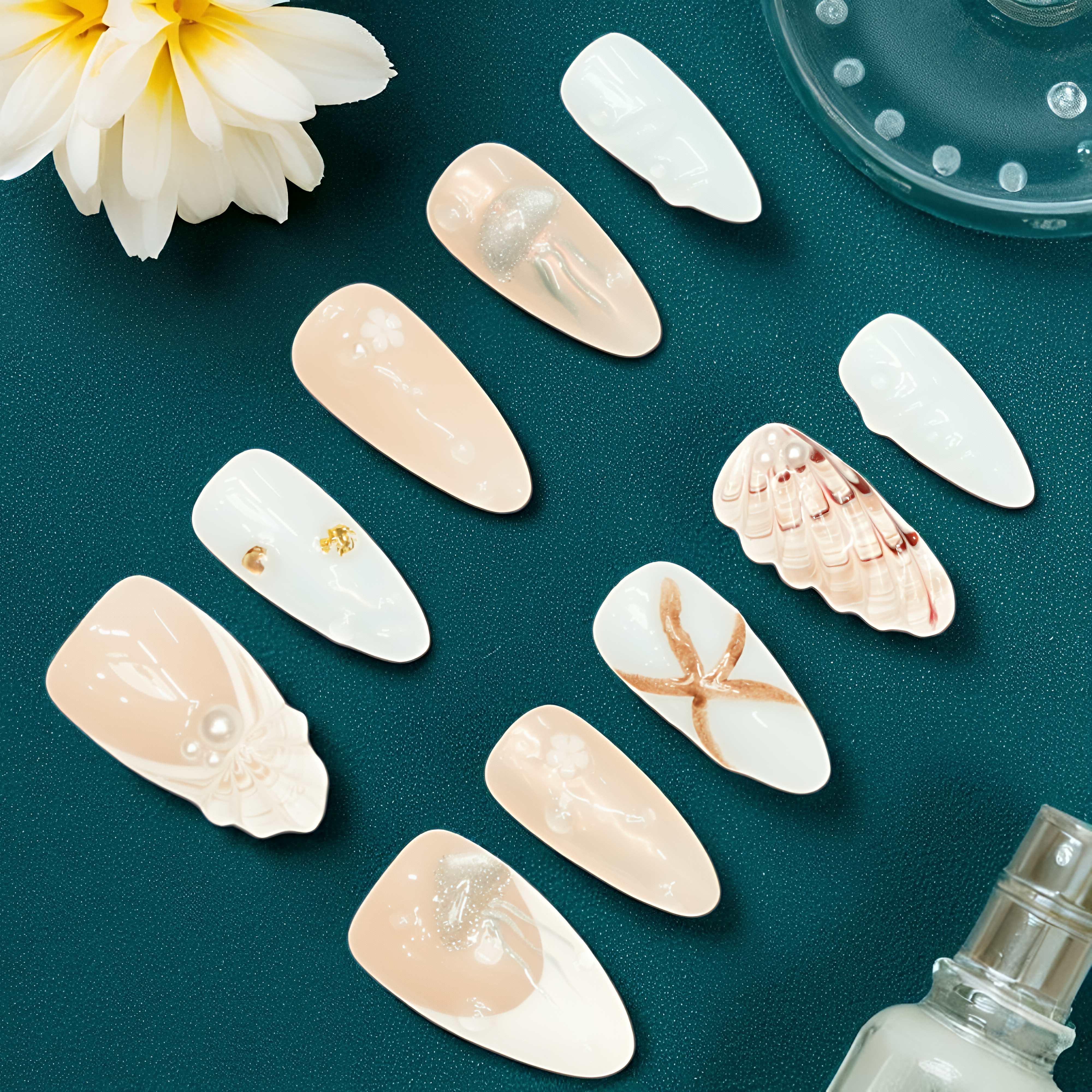 Soft pastel jelly nail set with ocean charms and pearl finish
