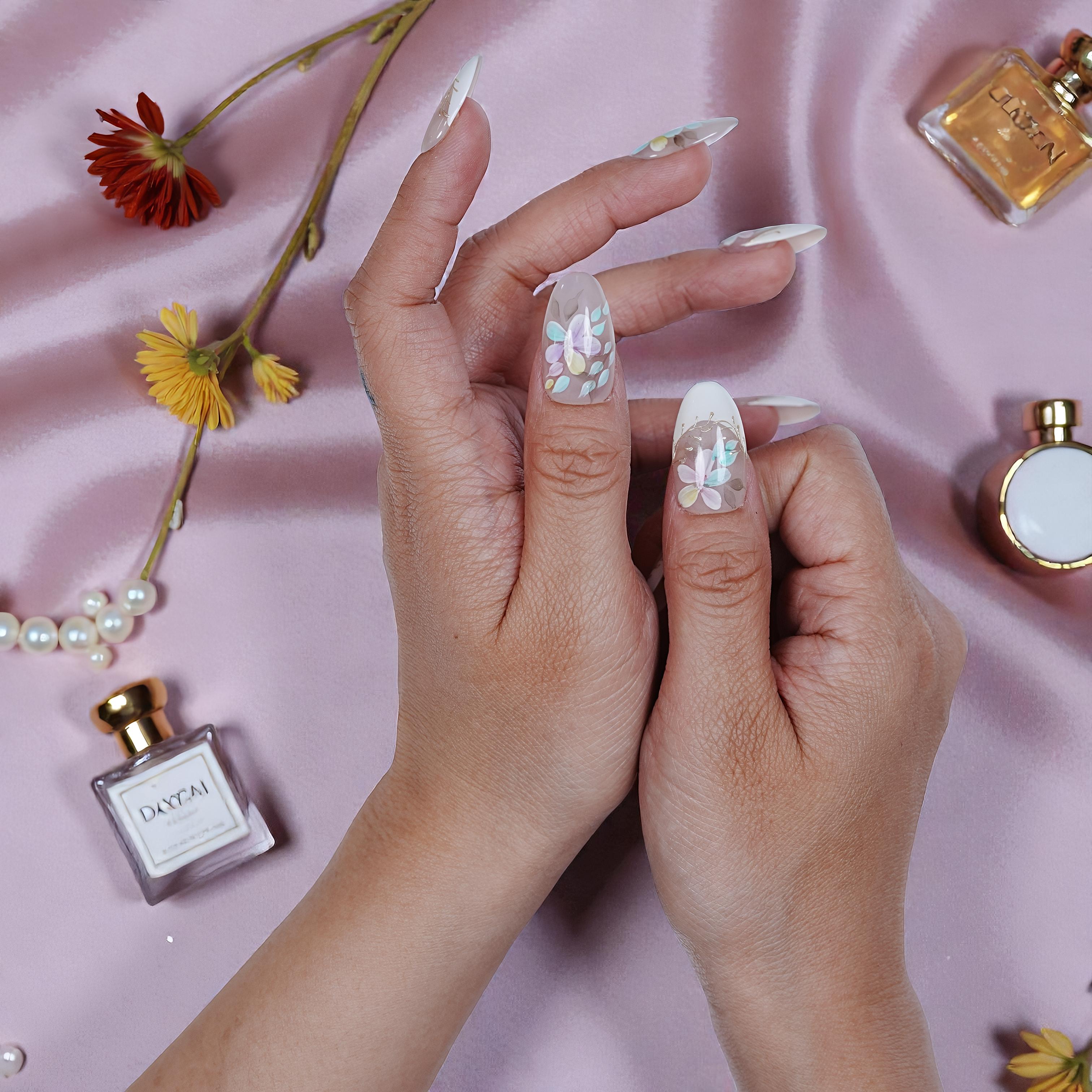 Detailed floral nail art on Blooming Mist stick on nails – perfect for soft elegant looks