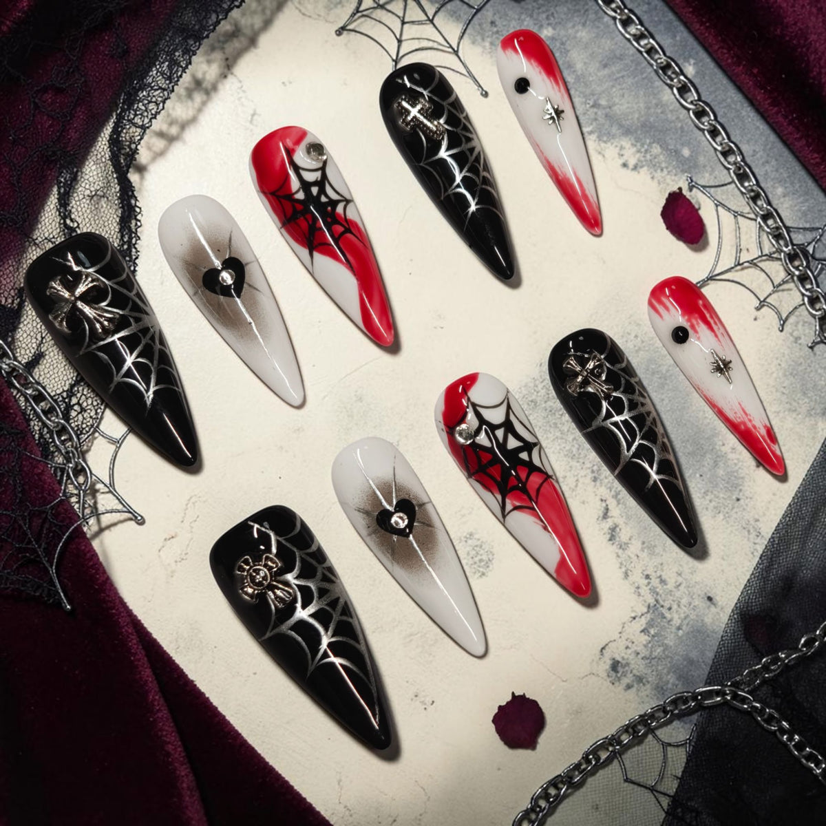 Widow's Web spider web press on nails, black, white and blood red stiletto set with silver crosses and crystals