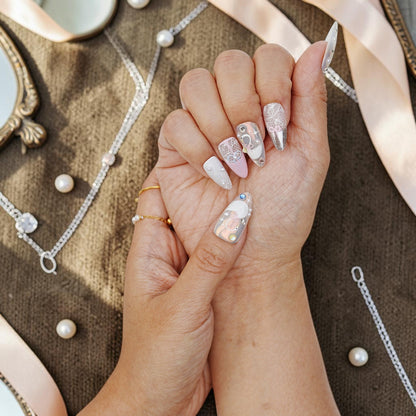 DSC00008 close up of coquette press on nails with pearls bows and chrome
