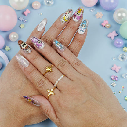 DSC00011 hand wearing cute character press on nails with kawaii bunny friends on glitter