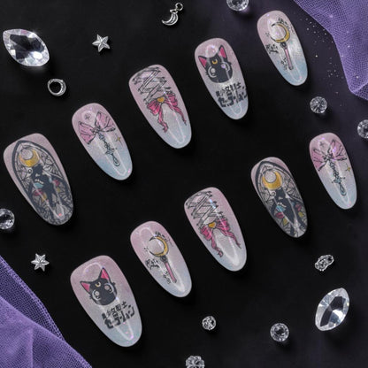 DSC00011 anime press on nails full set with a black cat, crescent moon wand and bows on aurora glitter laid flat