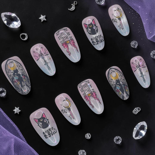 DSC00011 anime press on nails full set with a black cat, crescent moon wand and bows on aurora glitter laid flat