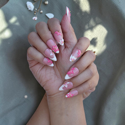 Handmade 3D flower press on nails in pink and white with a glossy finish