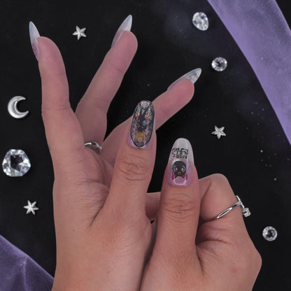 DSC00014 anime press on nails with crescent moon, bows and aurora glitter on a celestial flat lay