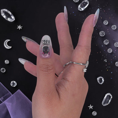 DSC00015 close up of celestial anime press on nails with a black cat and moon wand