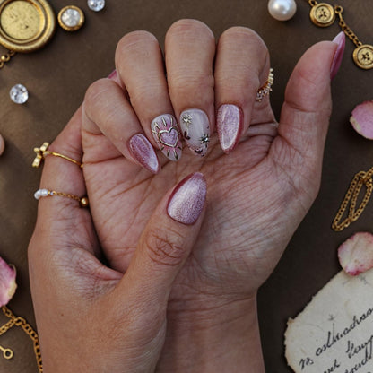 DSC00015 romantic heart press on nails with gold hearts and crystals on a vintage letter