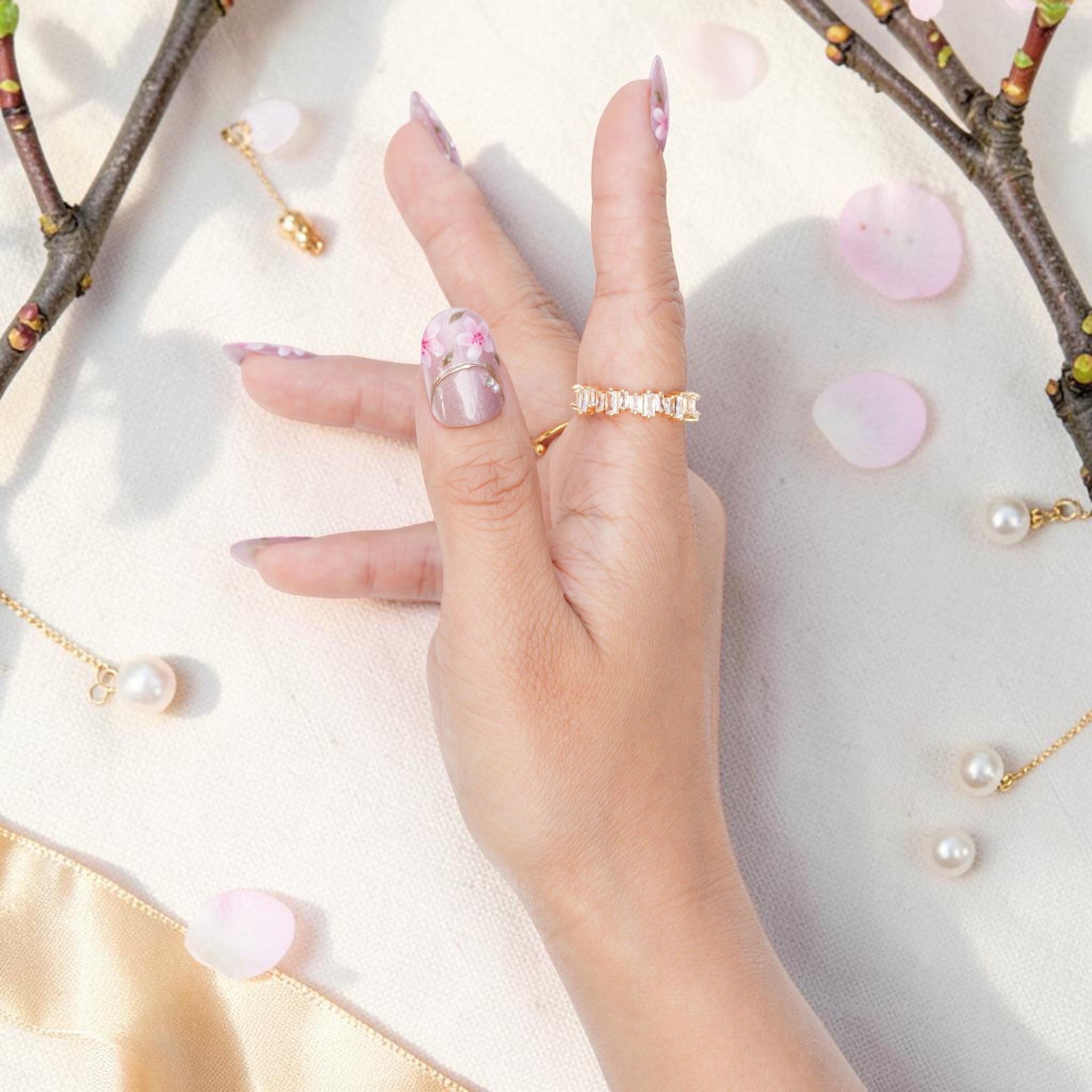 DSC00017 pearly pink sakura press on nails with fine gold line accents