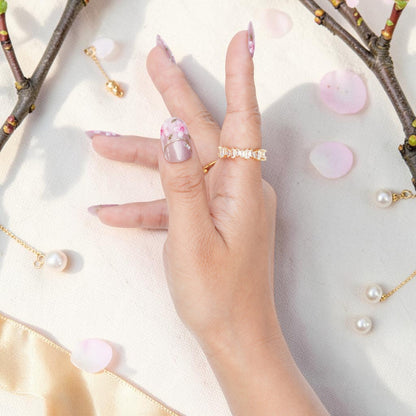 DSC00017 pearly pink sakura press on nails with fine gold line accents