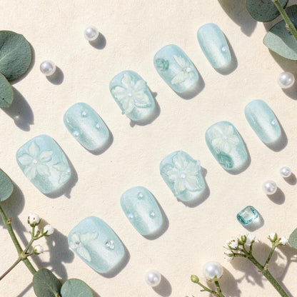 DSC00021 sage green press on nails full set with 3D white flowers butterflies and pearls laid flat