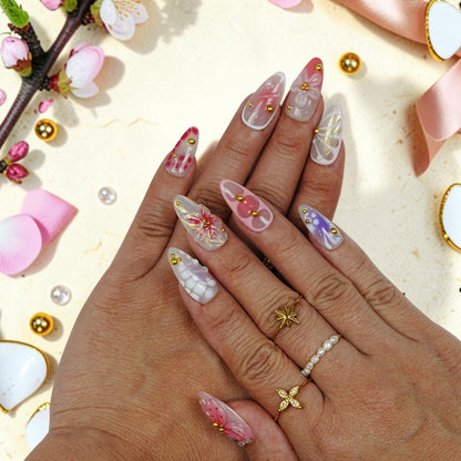DSC00030 hand wearing fairy press on nails with 3D butterfly wings and flowers