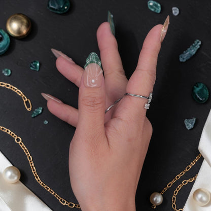 DSC00032 close up of emerald press on nails with molten gold framing and pearl accents