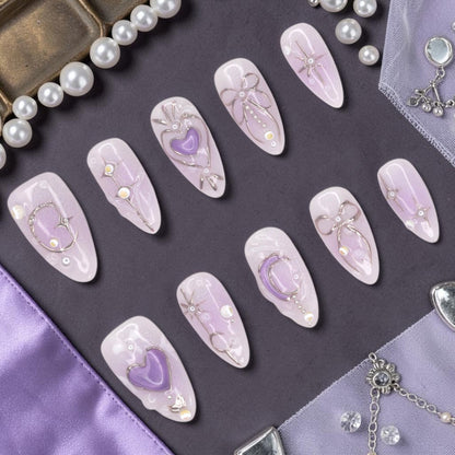 DSC00047 lavender press on nails full set with 3D purple hearts, silver wire bows and moons laid flat