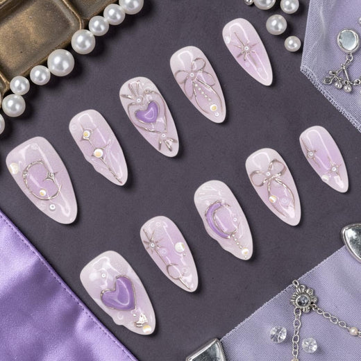 DSC00047 lavender press on nails full set with 3D purple hearts, silver wire bows and moons laid flat