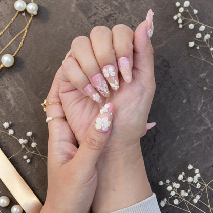 DSC00050 close up of pink jelly press on nail with a white 3D flower and gems