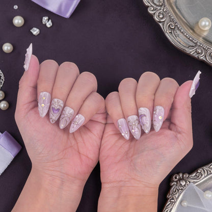 DSC00055 lavender press on nails with silver bows, crescent moons and pearl accents