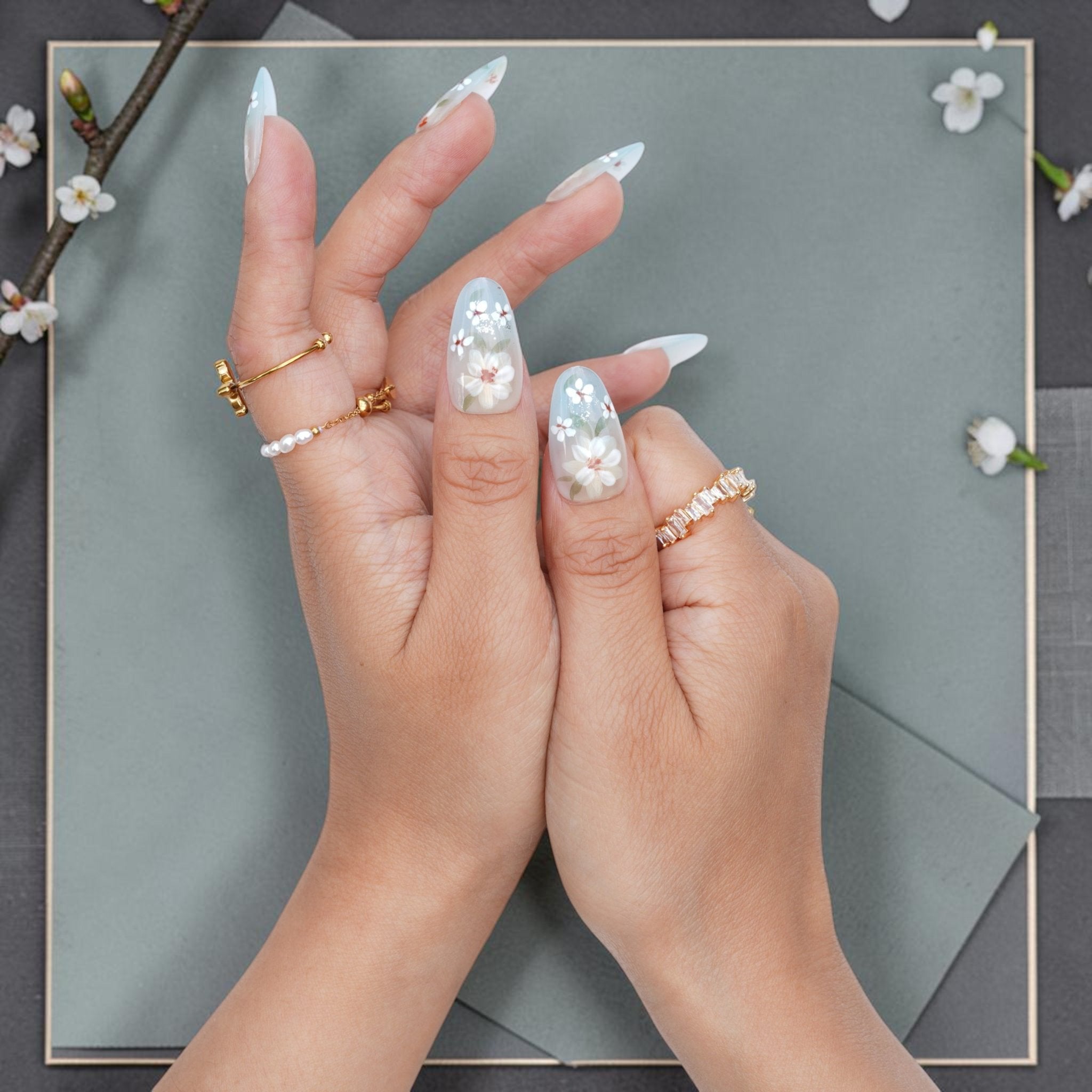 DSC00056 milky white and pale blue almond press on nails with white flowers