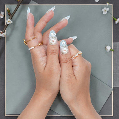 DSC00056 milky white and pale blue almond press on nails with white flowers