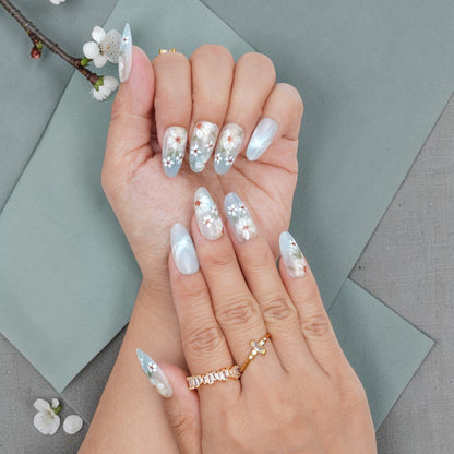 DSC00057 soft white floral press on nails with a pearl cat eye accent nail