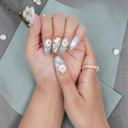 DSC00058 white blossom press on nails held with a cherry blossom branch