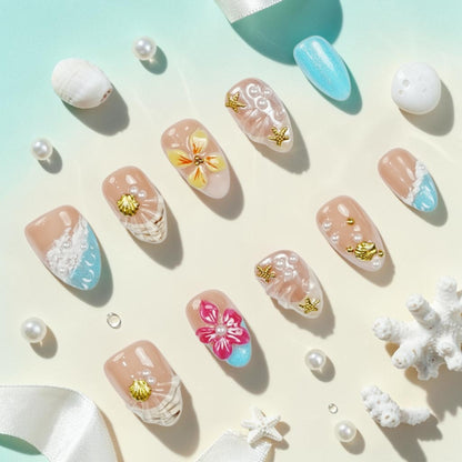 DSC00059 tropical press on nails full set with 3D hibiscus flowers, gold shells, starfish and pearls on a beach flat lay
