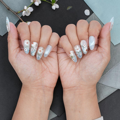 DSC00060 pair of hands showing white floral blossom press on nails