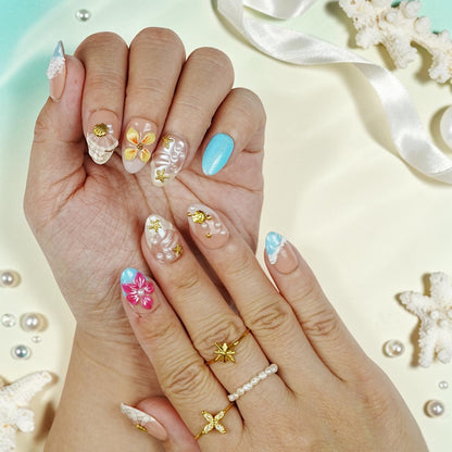 DSC00062 tropical press on nails with 3D seashells, pearls, gold starfish and an aqua cat eye nail