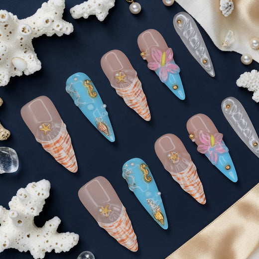 DSC00064 mermaid press on nails full set with gold 3D seahorses, starfish, shells and sculpted pink flowers laid flat